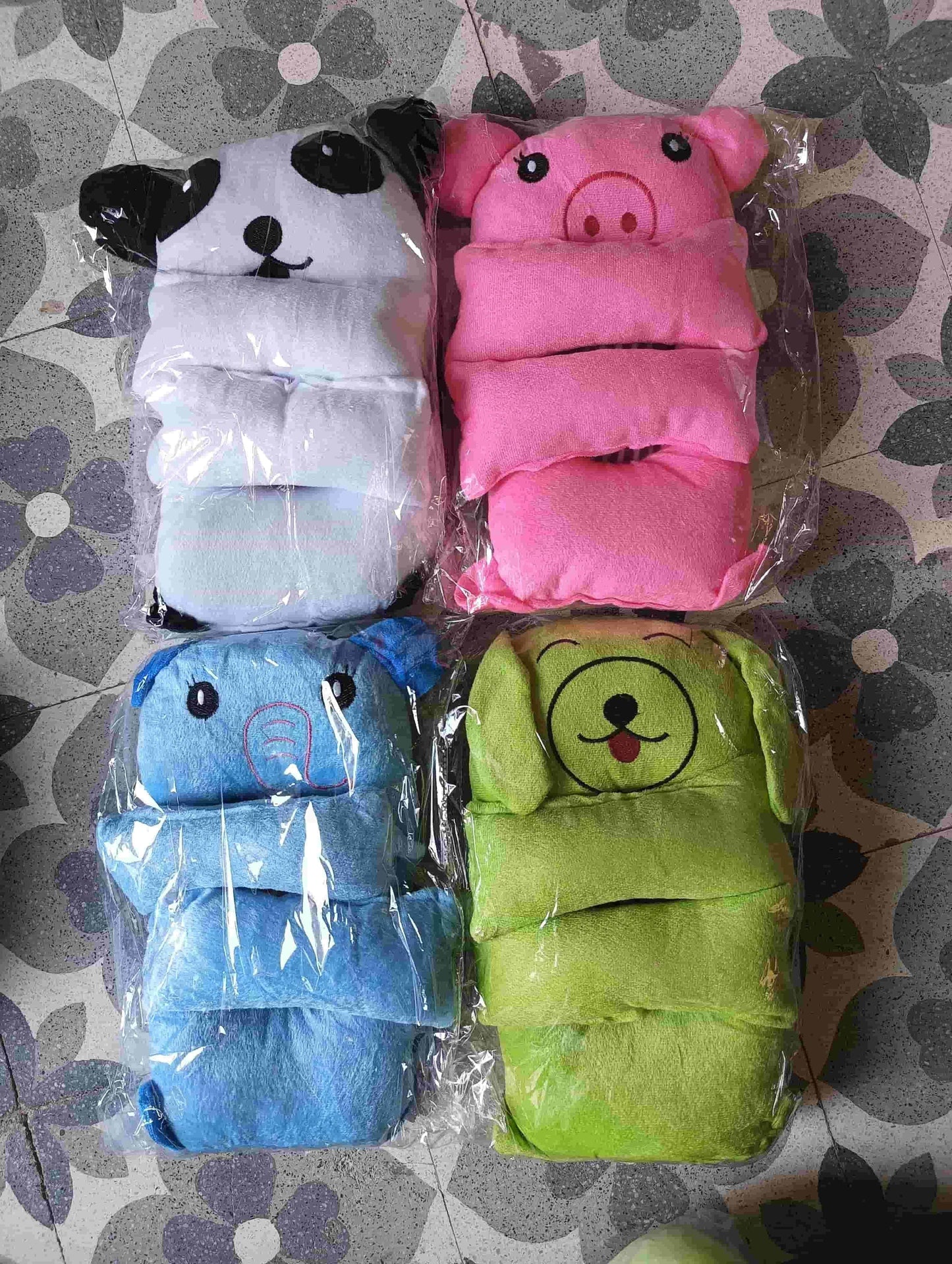Colorful baby head shaping pillow sets with animal designs including panda, pig, elephant, and dog