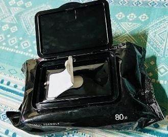 Black pack of eco-friendly sneaker cleaner wipes with resealable lid for easy use