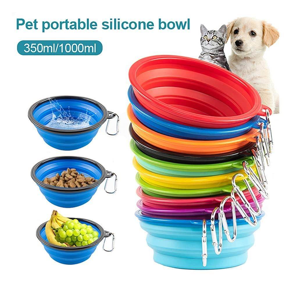 Stack of colorful foldable silicone pet bowls with carabiner clips and dog and cat in background
