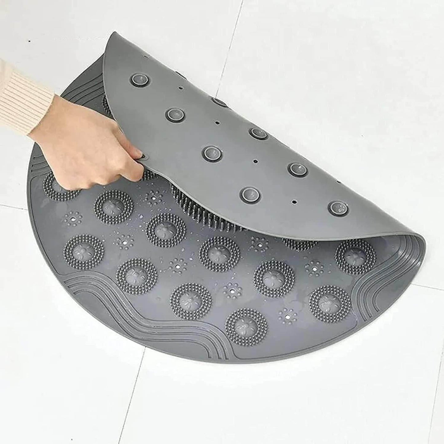 Gray durable foot scrubber mat for shower with suction cups and textured surface for exfoliation