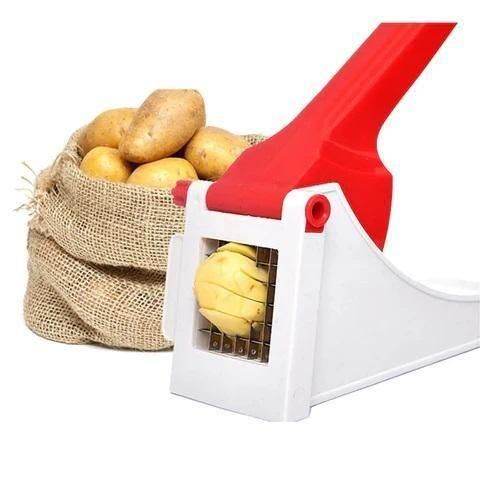 Heavy duty vegetable chopper with red handle cutting potatoes next to burlap sack of potatoes