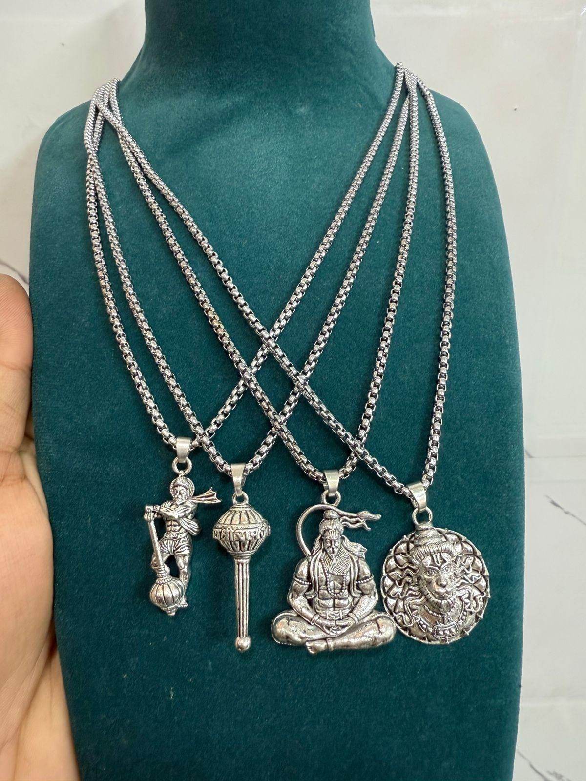 Silver Lord Hanuman pendant necklace collection with intricate designs on silver chains