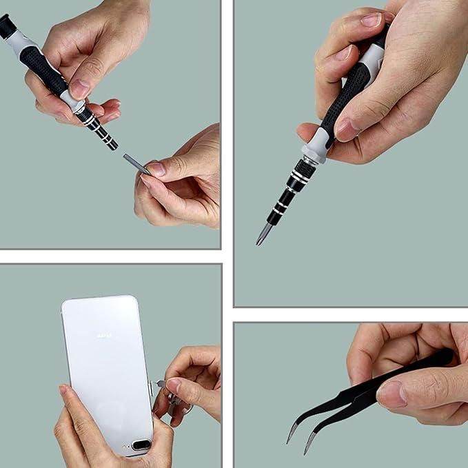 Hands using appliance and gadget maintenance tool kit with screwdriver and tweezers on electronic device