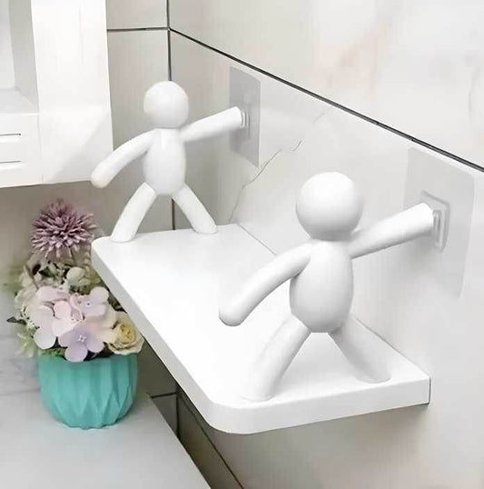 White bathroom organizer shelf for small spaces mounted on tiled wall with decorative figures and flowers