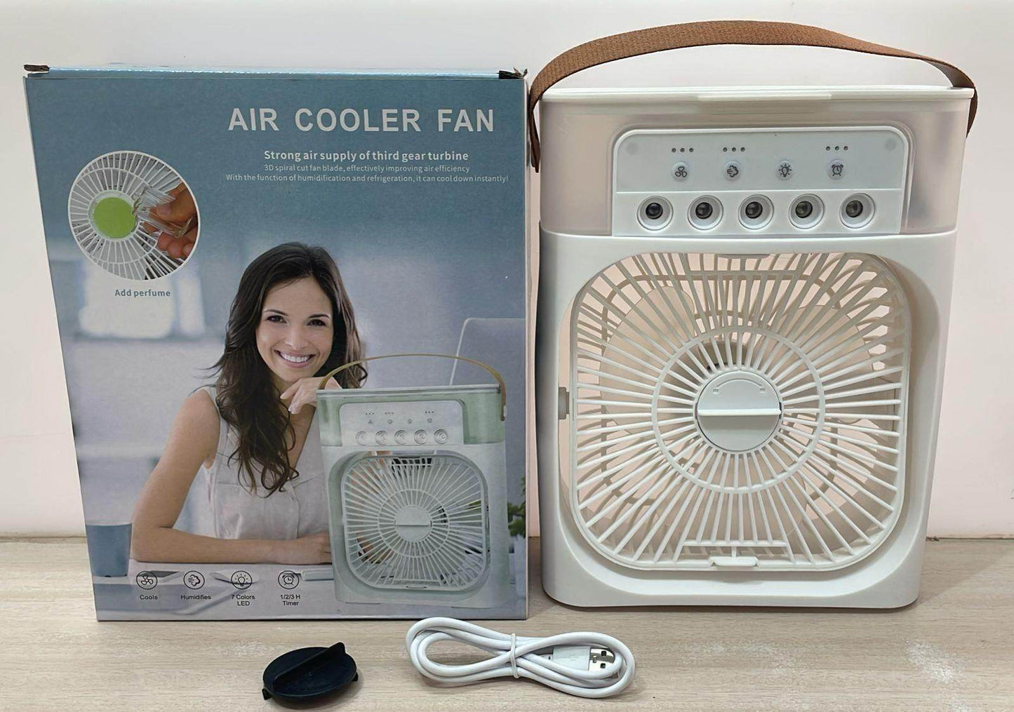 White cooling spray fan with water mist portable air cooler fan with adjustable settings and carrying strap