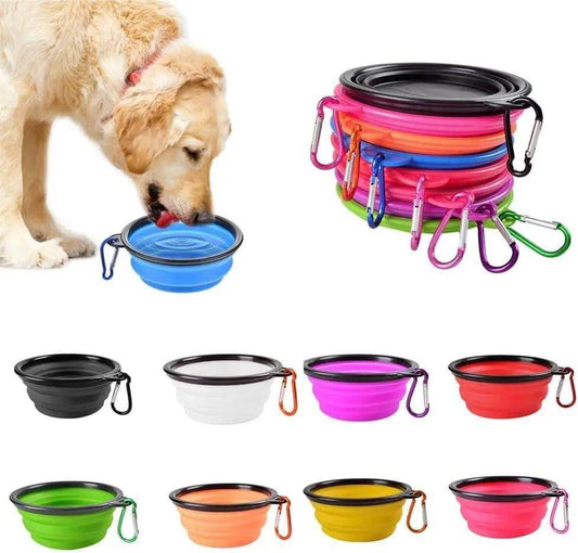 Foldable silicone pet bowl in multiple colors with carabiner clips shown with dog drinking from blue bowl