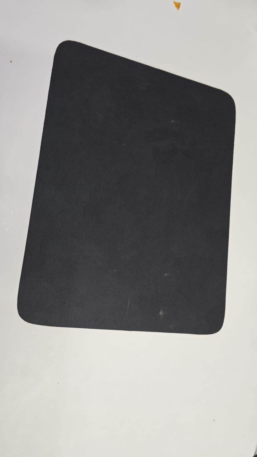 Black modern kitchen drying pad with a simple rectangular shape and rounded corners