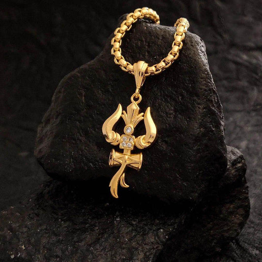 Gold Trishul pendant with chain featuring intricate design and embedded stones on black background