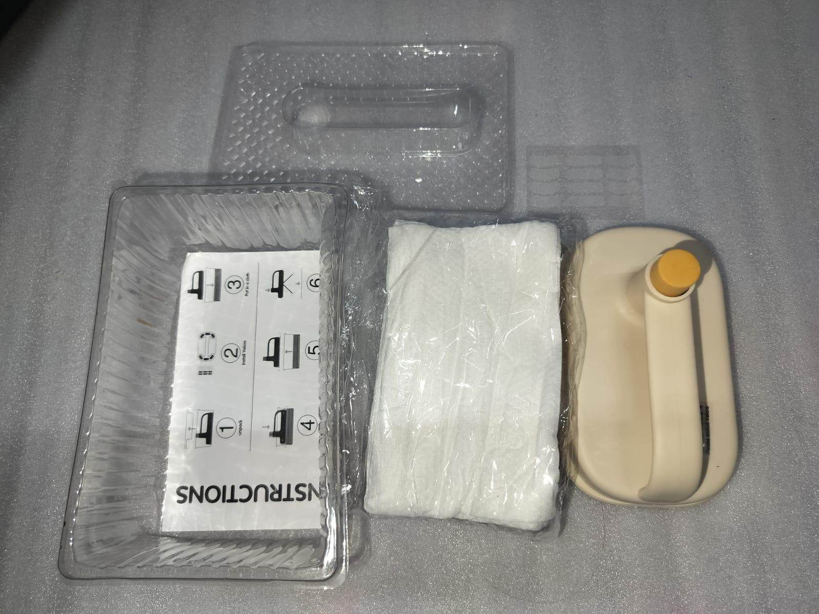 Disposable cleaning brush with handle set including brush, cleaning cloth, and instructions in packaging
