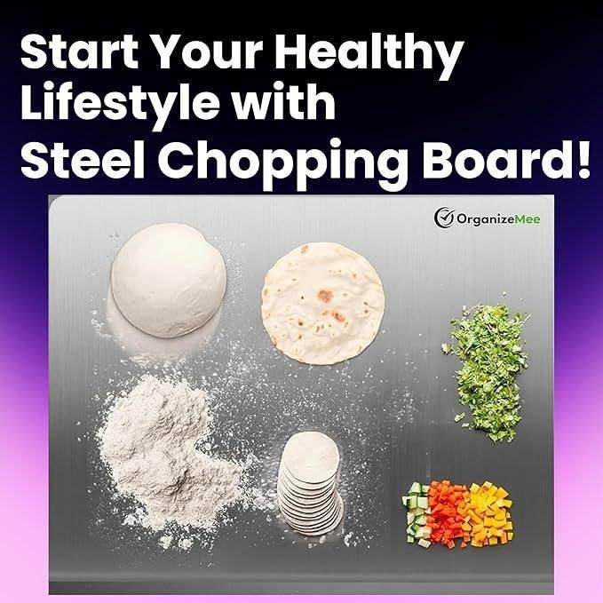 Stainless steel chopping board with dough, flour, flatbread, chopped herbs, and diced vegetables on top