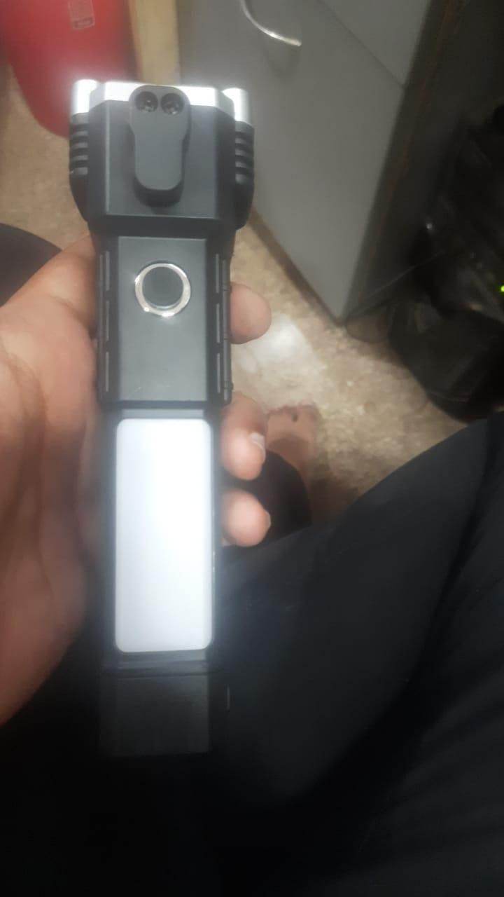 Handheld portable rechargeable LED flashlight with clip and multiple light panels