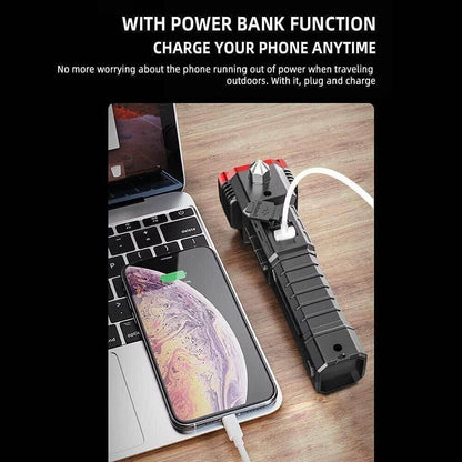 Portable rechargeable LED flashlight with power bank function charging a smartphone on laptop