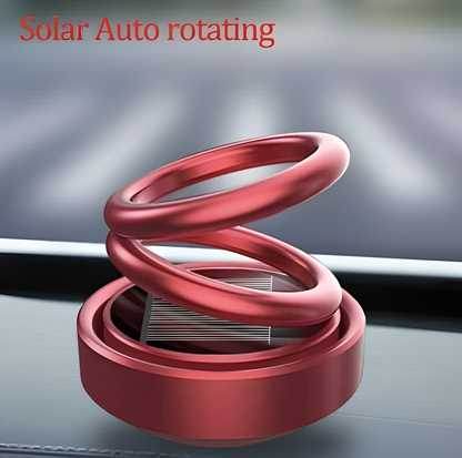 Red solar aromatherapy car accessory with auto rotating spiral design for fresh air