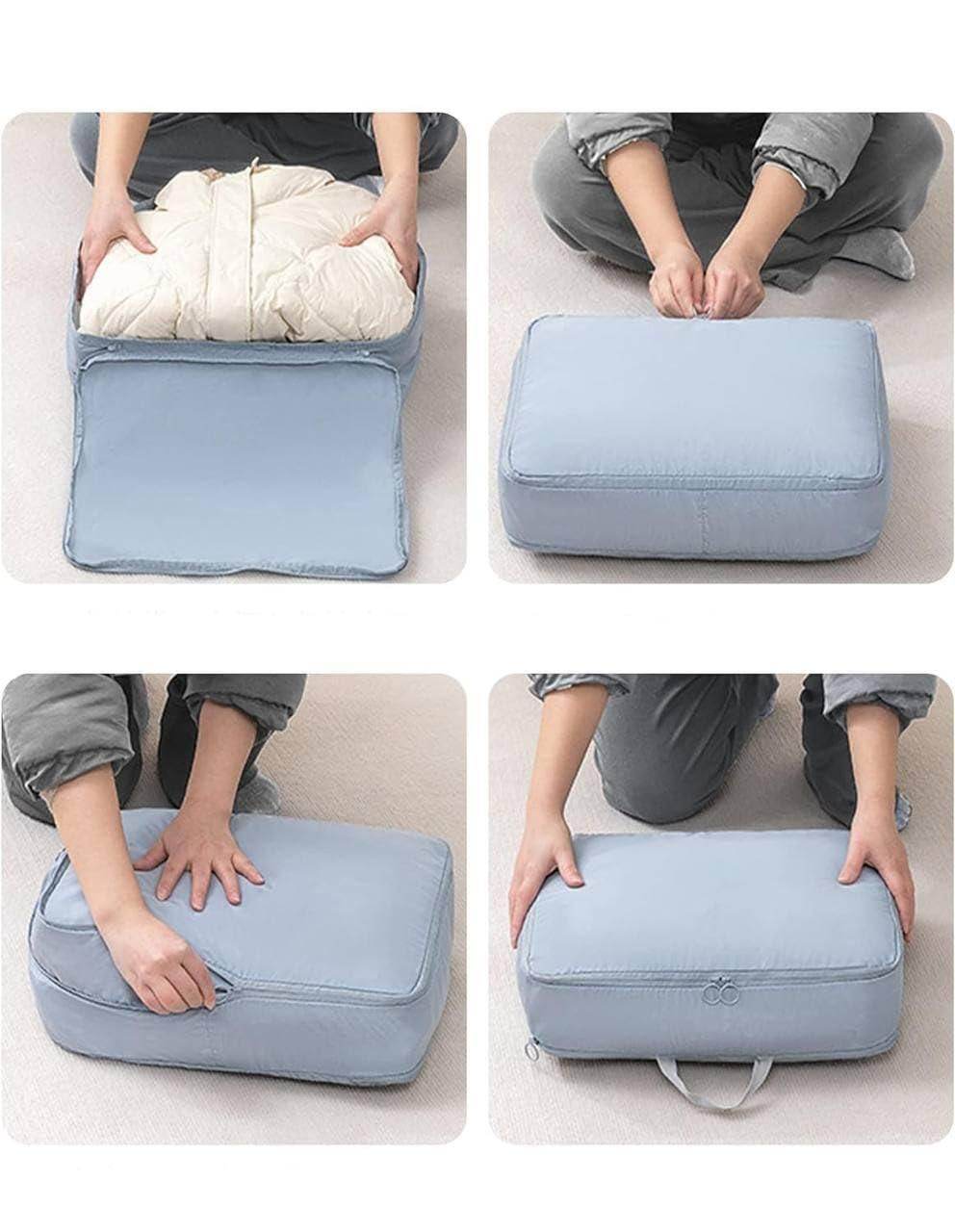 Blue space saving luggage organizer being packed and zipped to compress and store bulky clothing efficiently