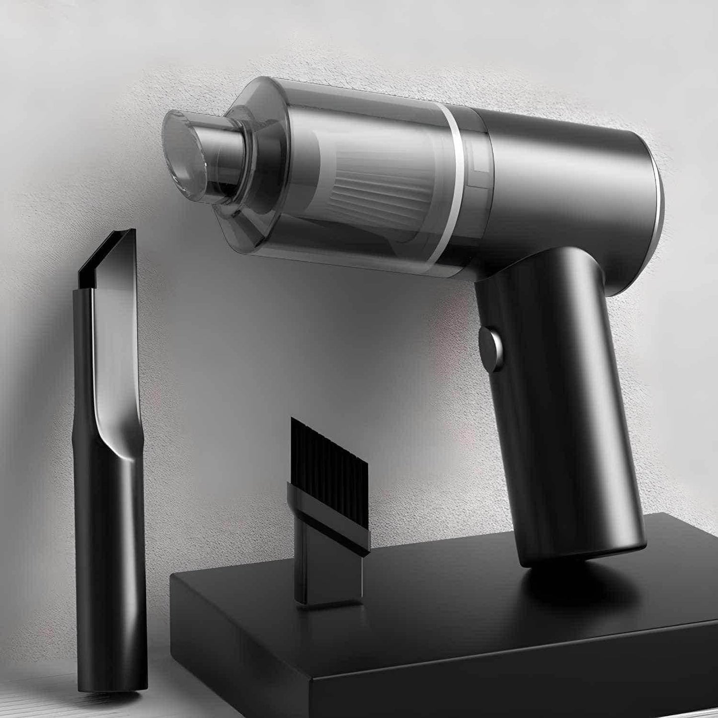 Black wireless mini vacuum cleaner with transparent dust container and two cleaning attachments on black stand